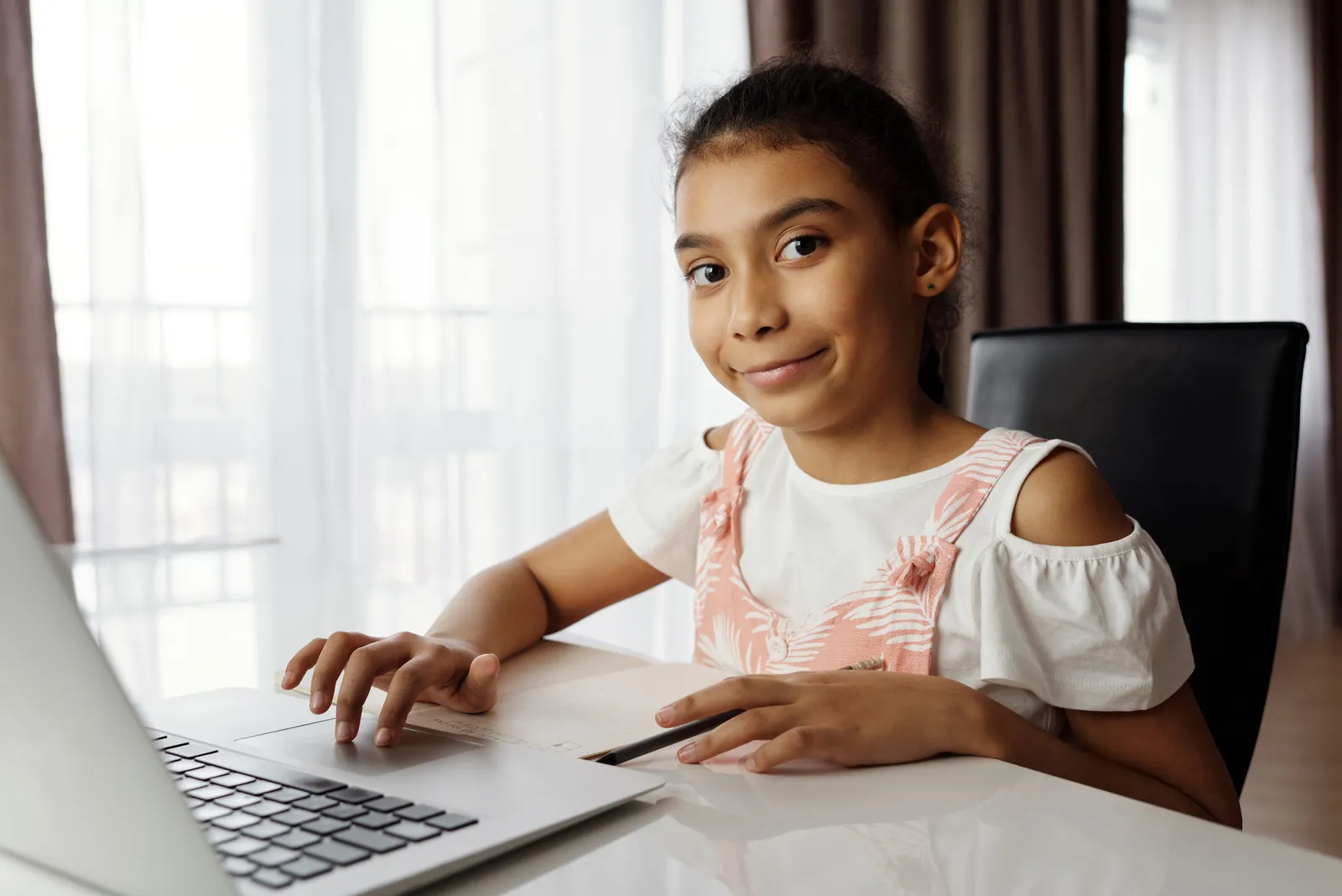 A student learning at home during an online support session